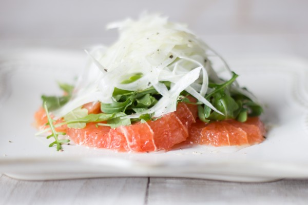 A simple salad of arugula, fennel, grapefruit dressed with honey and olive oil.