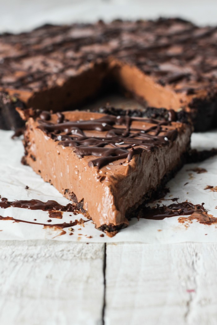 a decadent vegan gluten free chocolate tart kissed with cinnamon and spicy cayenne