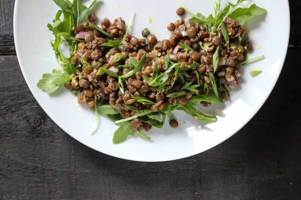 a savoury, salty and sweet lentil salad with anchovies, capers, and dates