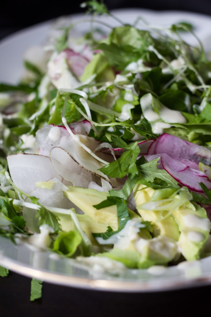 celebrate Spring with a crunch radish avocado salad with creamy lemon tahini dressing